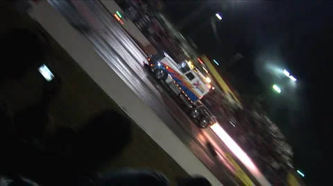 Tractor Trailer Semi with Jet Engine Racing Down Speedway Stock Footage 881007