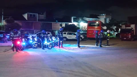 A tractor-trailer is transporting a train car in Bogotá Stock Footage 316834761