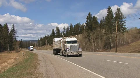 Tractor Trailers Hauling Freight in British Columbia 스톡 동영상 11024260