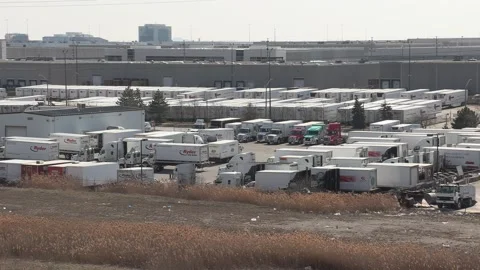 Tractor trailers sit parked during COVID 19 lockdown and economic recession Video stock 151664506