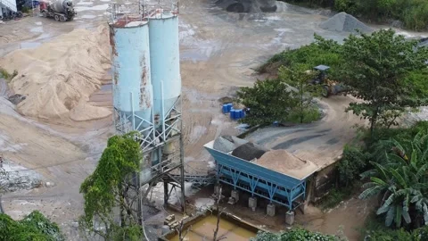 Tractor transporting raw materials for cement production into a grinding ma.. Stock Footage 327997449