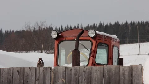 Tractor in a village Stock Footage 87240096