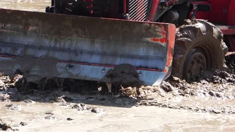 The tractor was working to beat the soil and mix it with water to grow the grain Stock Footage 146721288