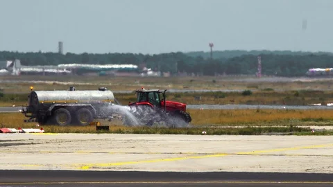 Tractor washes a runway Stock Footage 102440145