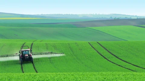 Tractor Watering the Field 動画素材 106466446