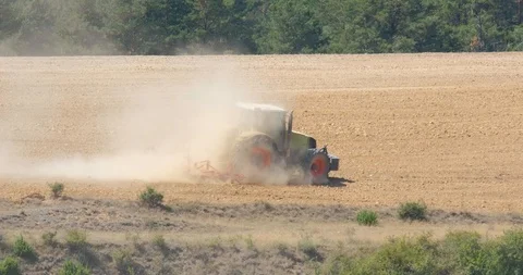 Tractor  in wheat field Stock Footage 121083686