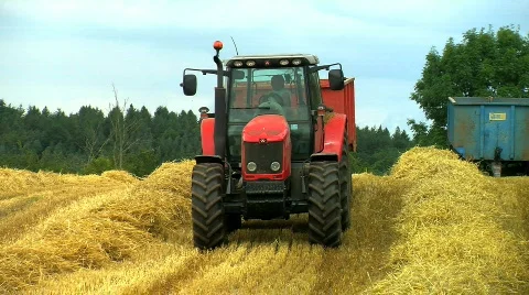 Tractor in a wheat field, JVC GY-HM100E Stock Footage 785341