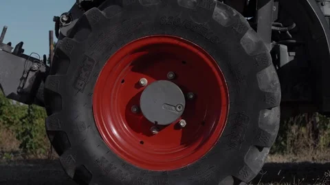 Tractor wheel while the agricultural machine is moving in the field. Stock Footage 270061854