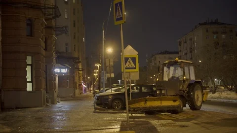 A tractor without a driver at night. 3rd Frunzenskaya street. 動画素材 103979521