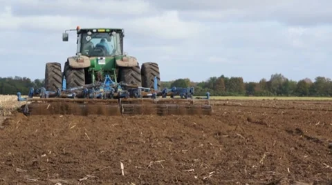Tractor at work, farm field Stock Footage