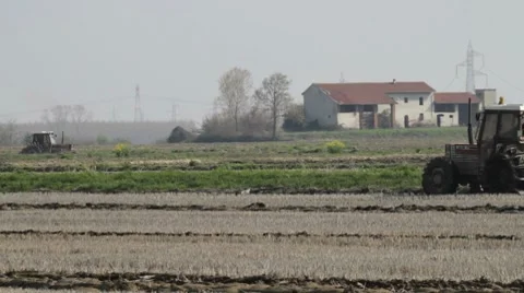 Tractor to work in a field Stock Footage 8568461