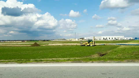 Tractor working on construction site 스톡 동영상 173549360