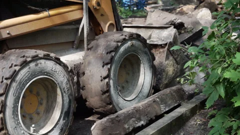 The tractor is working on a construction site. Stock Footage 252985971