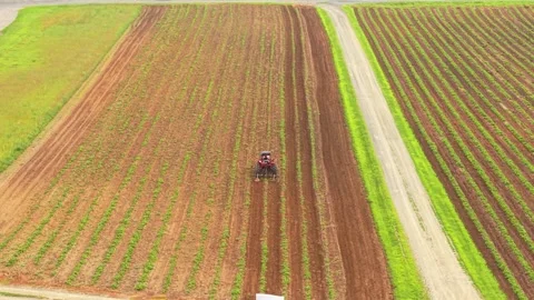 Tractor Working On A Farm Stock Footage 343976628