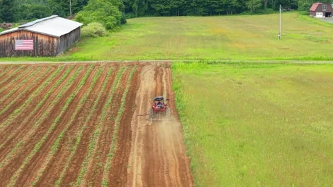 Tractor Working On A Farm Stock Footage 343976681