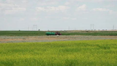 Tractor Working on a Farmland Stock Footage 319467116