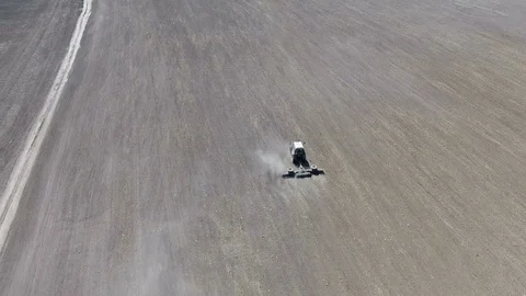 Tractor working in the field. Aerial view Stock Footage 75189730