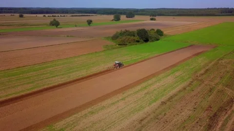 Tractor working on field at autumn. Stock Footage 160966660