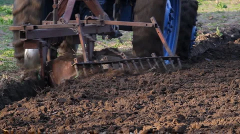 Tractor working in the field Stock Footage 5298374