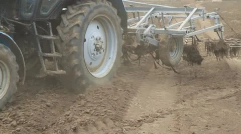 Tractor working in the field Stock-Footage 22293130
