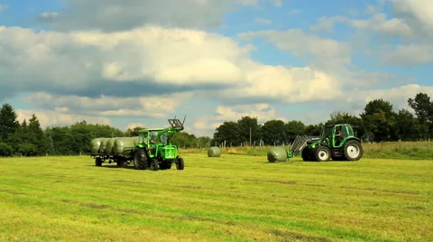 Tractor working in the field Stock Footage 54614239
