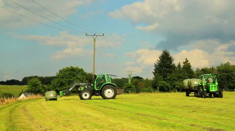 Tractor working in the field Stock Footage 54614792