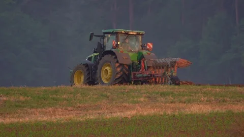 The tractor is working in the field Stock Footage 251417043