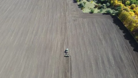 Tractor working on the field. Nature background. Stock Footage 217931154