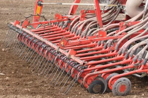 Tractor working on the field Stock Photos