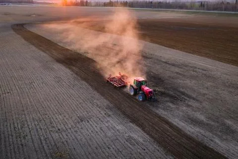Tractor working field Foto stock