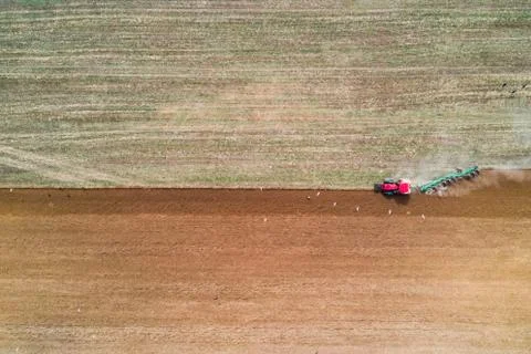 Tractor working in field Foto stock