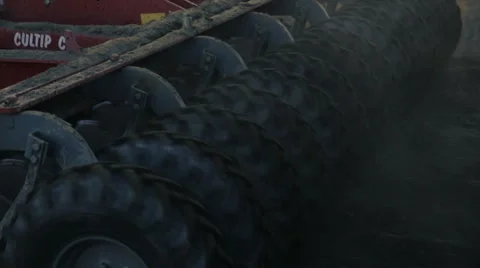 Tractor working in the grain fields - tight shot of the wheels 動画素材 40243047