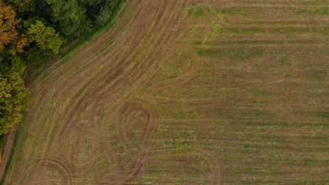 Tractor working one farm field drone view Stock Footage 141818245