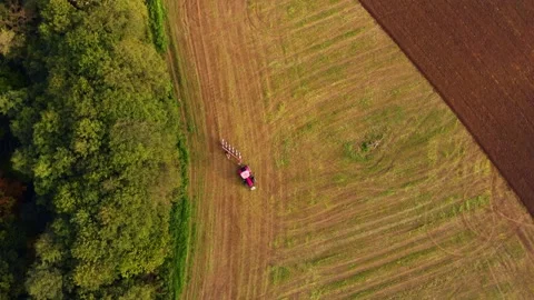 Tractor working one farm field drone view Stock Footage 141819585