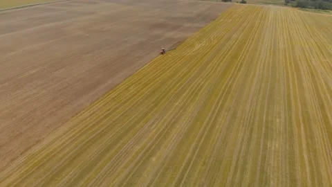 Tractor working on the prairie 스톡 동영상 149720838
