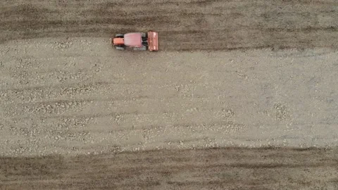Tractor working on soil prepare for rice plantation aerial view Stock-Footage 153232535