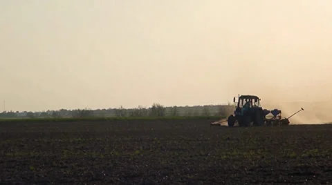 A tractor works on the field Stock Footage 37535851