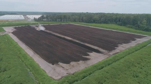Tractor works on the field Stock Footage 93356567