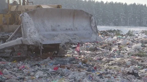 Tractor works at garbage dump in winter, Russia 스톡 동영상 101949349
