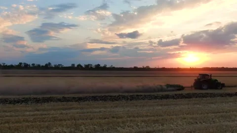 Tractor works the land Stock Footage 137030275