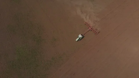 Tractor works with a plow on the field Stock Footage 89707418