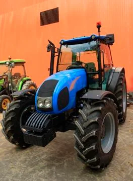 Tractor in the yard of the farmer Stock Photos