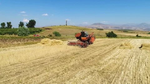 Tractor by yellow fields Stock-Footage 129711496