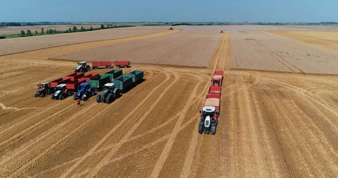 Tractors complete the work and park Stock-Footage 127818079