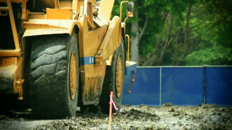 Tractors-earthmover from back Stock Footage 1044446