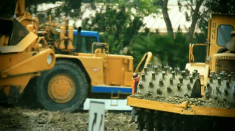 Tractors-earthmover-construction man Stockbeeldmateriaal 1044489