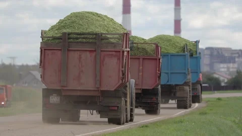 Tractors with harvest Stock Footage 145800358