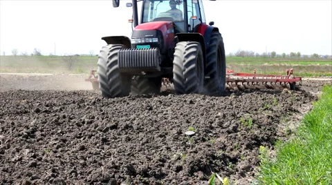 Tractors preparing land for sowing Stock Footage 2913610