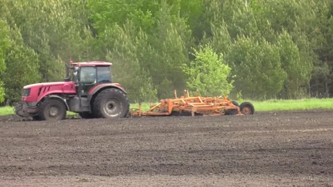 Tractors preparing land for sowing. Stock Footage 281914121