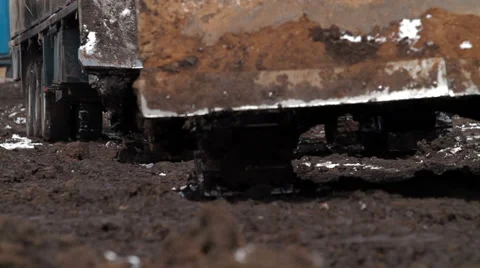 Tractors ride through mud Stock-Footage 59975560